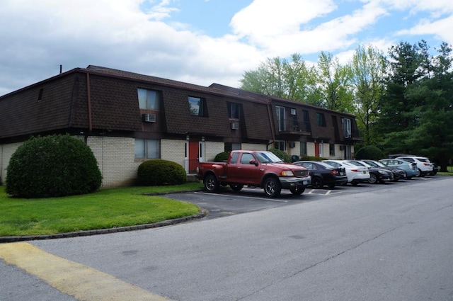 1115 Cherry Hill Dr, Poughkeepsie, NY 12603 - view of building exterior with uncovered parking