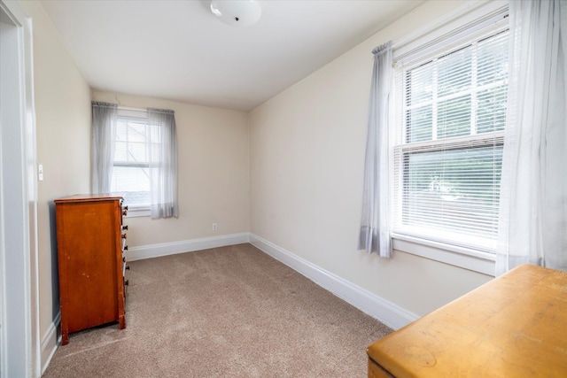 265 Brower Ave, Rockville Centre, NY 11570 - unfurnished bedroom featuring carpet flooring and baseboards
