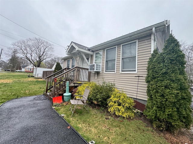 3 Ocean Ave, Mastic, NY 11950 - view of front of property featuring a front yard and cooling unit