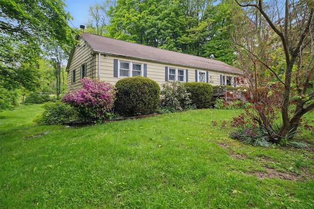 view of front of home with a front yard