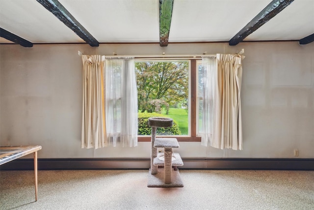 detailed view of beamed ceiling and a baseboard radiator