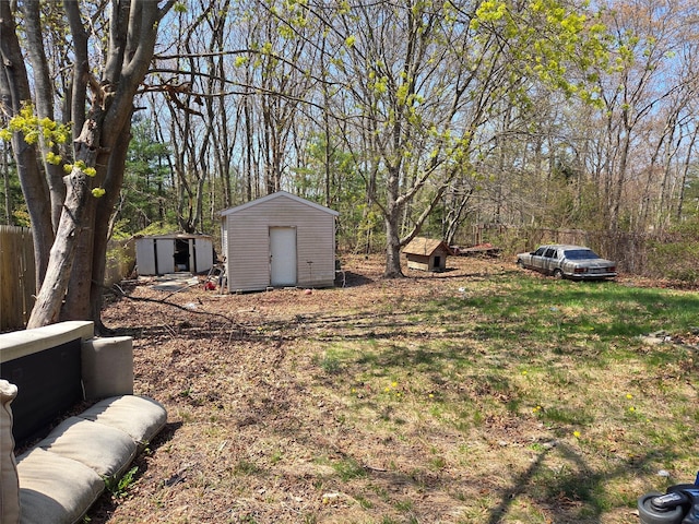 6 Bullard St, Mastic, NY 11950 - view of yard with a storage shed, an outdoor structure, and fence
