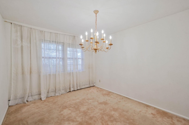 39 Pinewood Dr, Commack, NY 11725 - unfurnished room featuring carpet, a chandelier, and baseboards