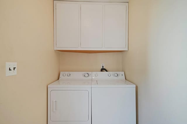39 Pinewood Dr, Commack, NY 11725 - laundry area featuring cabinet space and washer and dryer