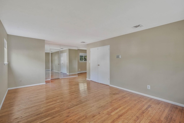 39 Pinewood Dr, Commack, NY 11725 - unfurnished room with baseboards and light wood-type flooring