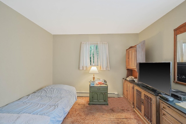 39 Pinewood Dr, Commack, NY 11725 - bedroom with light carpet and a baseboard heating unit
