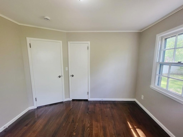7 Randall Ter, Middletown, NY 10940 - empty room featuring plenty of natural light, dark wood finished floors, baseboards, and ornamental molding