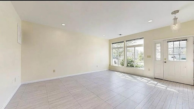 162 Commodore Cir E, Arverne, NY 11692 - entryway with baseboards, recessed lighting, and light tile patterned floors