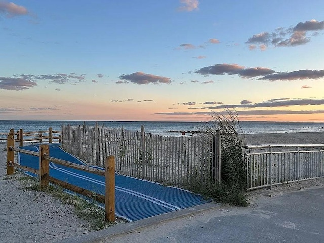 162 Commodore Cir E, Arverne, NY 11692 - gate with a water view and fence