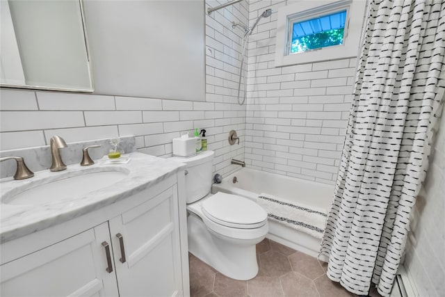 115 19th St, Wading River, NY 11792 - full bathroom with toilet, tile walls, vanity, shower / bath combination with curtain, and tile patterned flooring