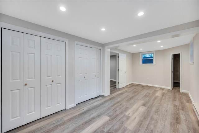 115 19th St, Wading River, NY 11792 - below grade area featuring light wood-style flooring, baseboards, and recessed lighting