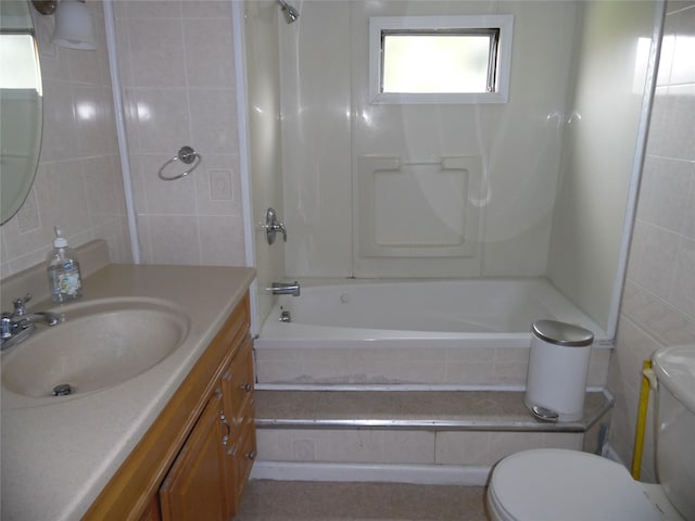 8 Crumley Van Vactor Rd, Ferndale, NY 12734 - bathroom featuring tile walls, toilet, tiled shower / bath combo, and vanity