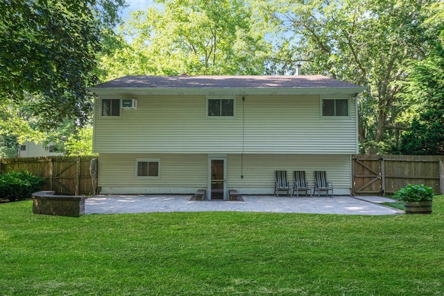 27 Columbus Ave, Kings Park, NY 11754 - rear view of house with a gate and a patio area