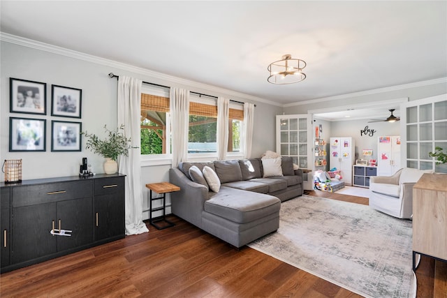 8 Vera Ct, West Islip, NY 11795 - living room featuring dark wood finished floors, ornamental molding, a chandelier, and a ceiling fan