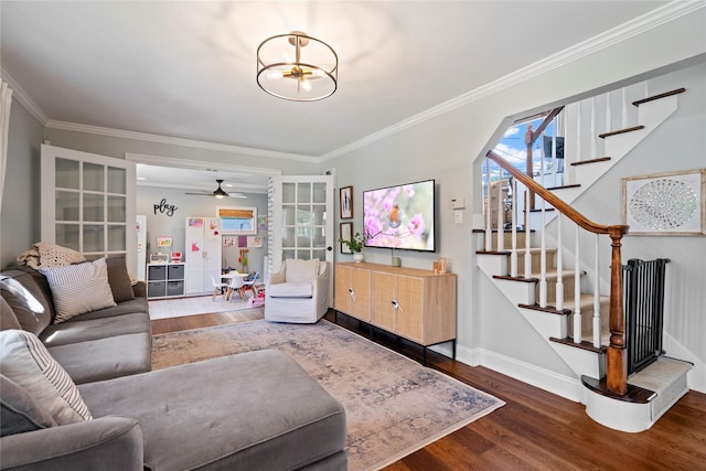 8 Vera Ct, West Islip, NY 11795 - living room with wood finished floors, stairway, a ceiling fan, ornamental molding, and baseboards
