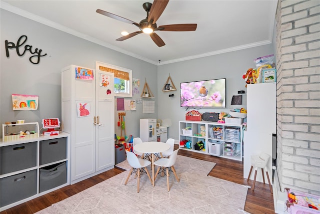 8 Vera Ct, West Islip, NY 11795 - playroom featuring wood finished floors, a ceiling fan, and crown molding