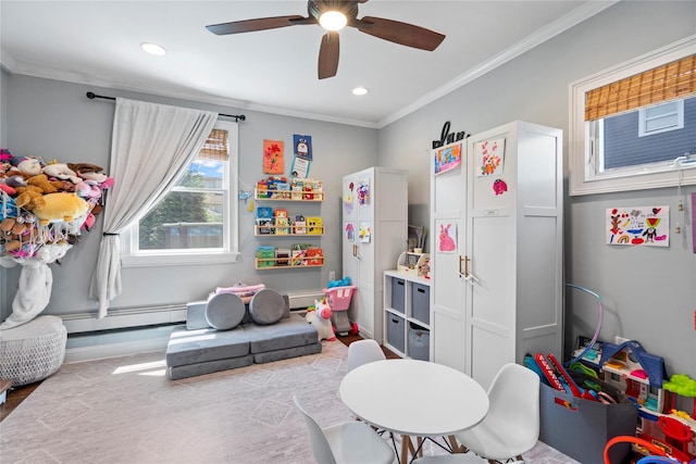 8 Vera Ct, West Islip, NY 11795 - rec room featuring a ceiling fan, wood finished floors, crown molding, a baseboard radiator, and baseboards