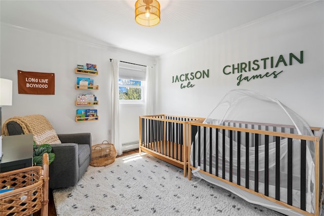 8 Vera Ct, West Islip, NY 11795 - carpeted bedroom with ornamental molding, a nursery area, and baseboard heating