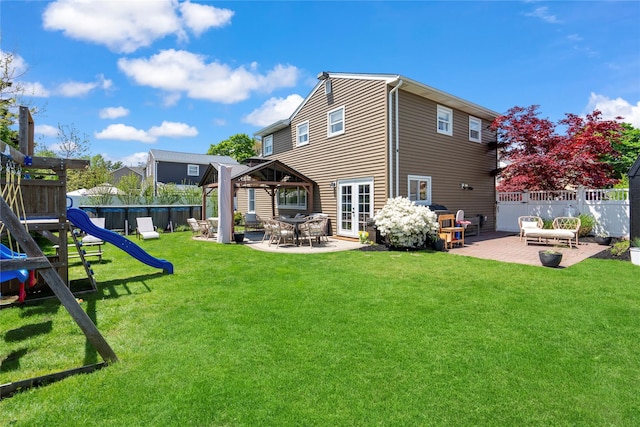 8 Vera Ct, West Islip, NY 11795 - rear view of property featuring a gazebo, a patio area, a playground, and french doors