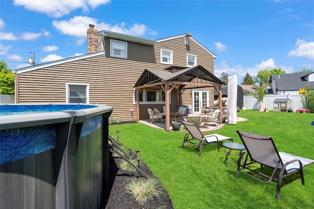 8 Vera Ct, West Islip, NY 11795 - rear view of house featuring a gazebo, a chimney, and a patio