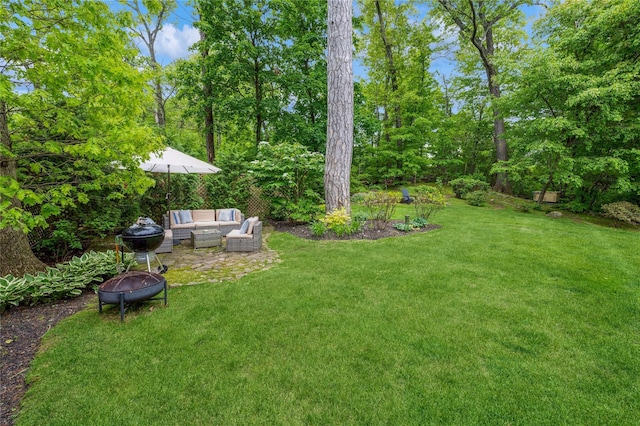 125 Hawkes Ave, Ossining, NY 10562 - view of green lawn featuring an outdoor living space with a fire pit