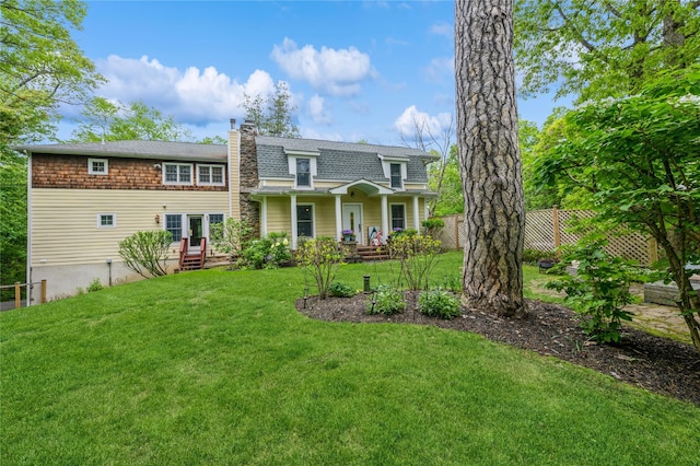 125 Hawkes Ave, Ossining, NY 10562 - rear view of property featuring a chimney and roof with shingles