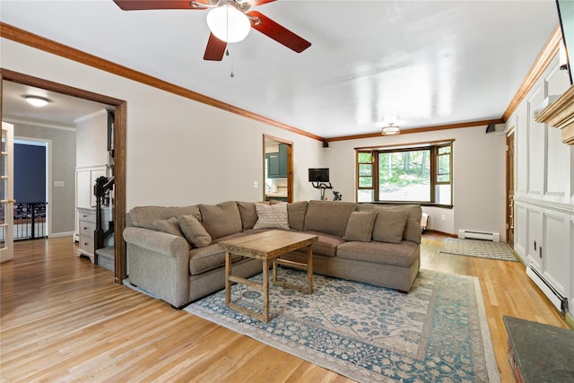 50 Maple Wood Dr, Brewster, NY 10509 - living room with a baseboard radiator, light wood-style floors, a ceiling fan, ornamental molding, and baseboards