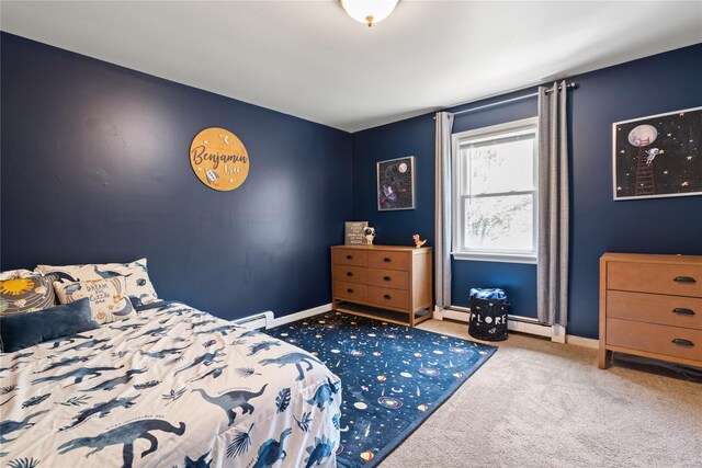 50 Maple Wood Dr, Brewster, NY 10509 - carpeted bedroom featuring baseboards and a baseboard heating unit