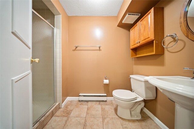 50 Maple Wood Dr, Brewster, NY 10509 - full bathroom with a baseboard radiator, baseboards, a stall shower, toilet, and a textured ceiling