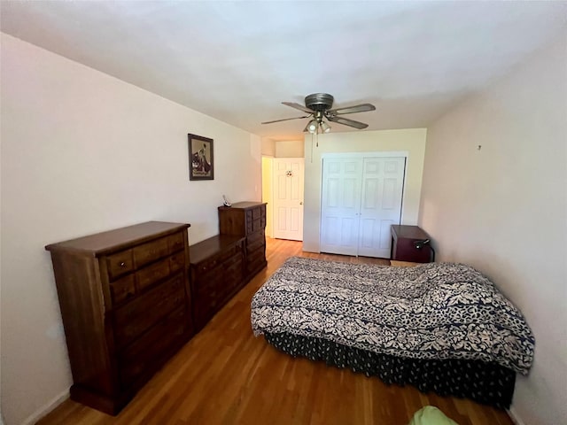 86-10 151st Ave Unit 4G, Howard Beach, NY 11414 - bedroom with wood finished floors, a closet, a ceiling fan, and baseboards