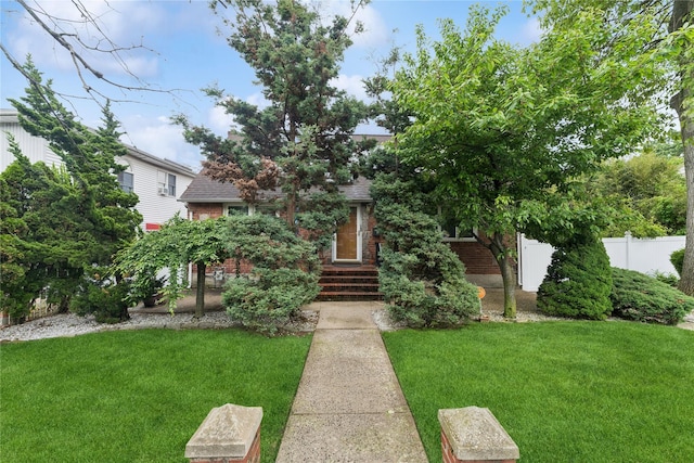 539 Keller Ave, Elmont, NY 11003 - view of property hidden behind natural elements with brick siding