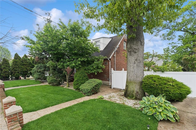 539 Keller Ave, Elmont, NY 11003 - view of side of home with brick siding and a shingled roof
