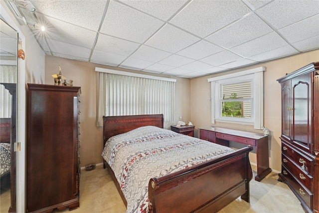 539 Keller Ave, Elmont, NY 11003 - bedroom with light colored carpet, a paneled ceiling, and baseboards