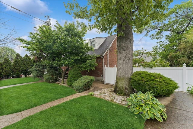 539 Keller Ave, Elmont, NY 11003 - view of side of home featuring brick siding and roof with shingles