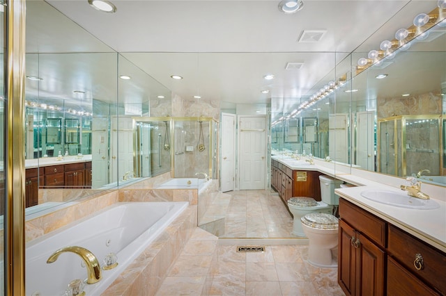 58 Roundtop Rd, Yonkers, NY 10710 - full bathroom with a whirlpool tub, toilet, a stall shower, two vanities, and recessed lighting
