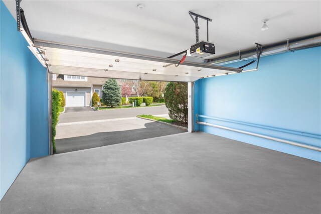 58 Roundtop Rd, Yonkers, NY 10710 - garage with a garage door opener