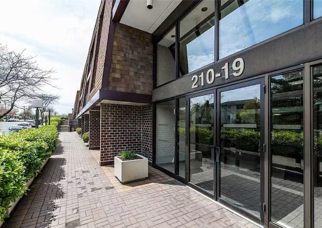 21019 26th Ave Unit 2N, Bayside, NY 11360 - property entrance with brick siding