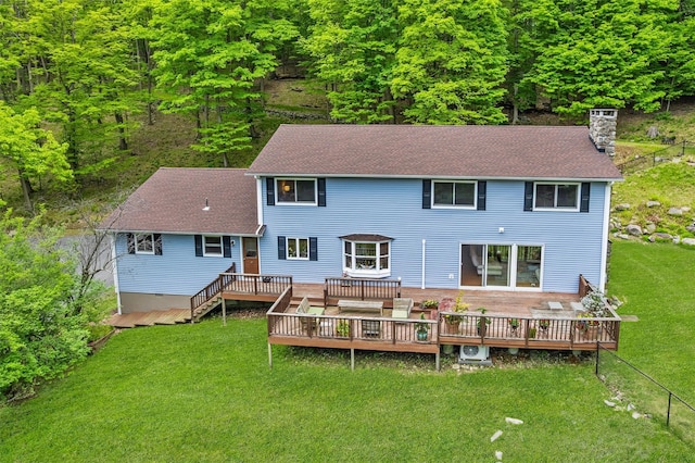 5 Bellwood Ln, Cornwall On Hudson, NY 12520 - back of property featuring a deck, a chimney, a lawn, and roof with shingles