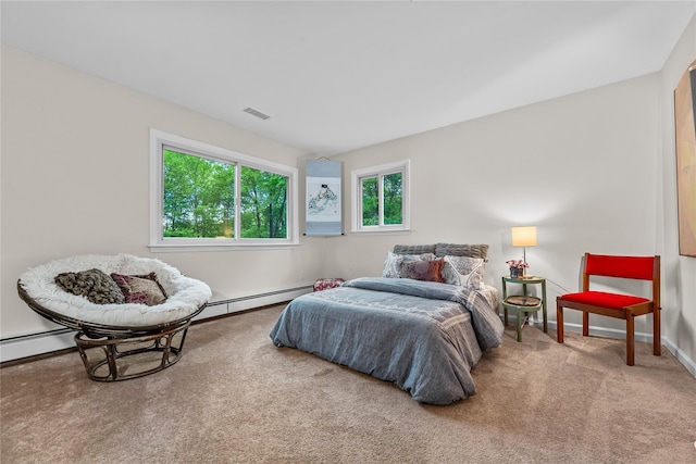 5 Bellwood Ln, Cornwall On Hudson, NY 12520 - carpeted bedroom featuring a baseboard heating unit and baseboards