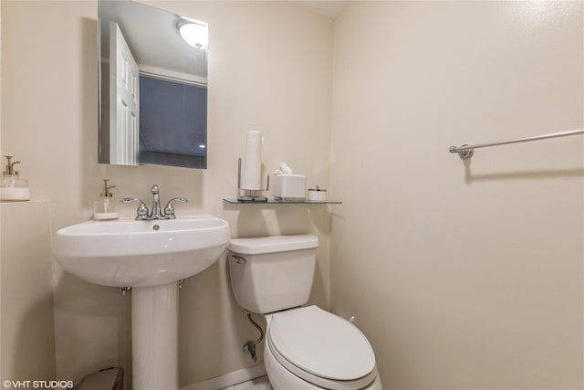 half bathroom with toilet