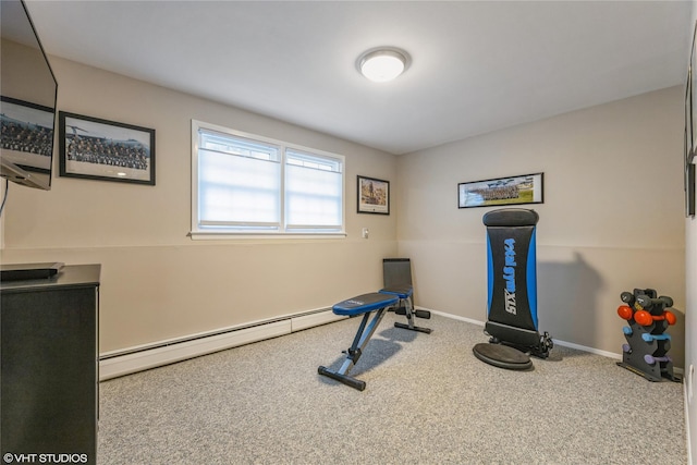 exercise room featuring carpet, a baseboard heating unit, and baseboards
