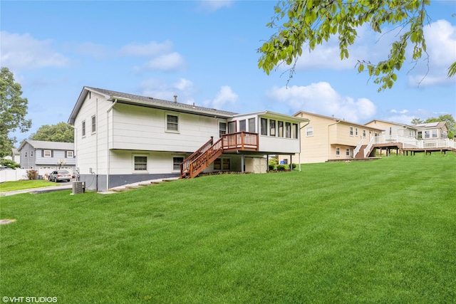 11 Sagamore Ave, Suffern, NY 10901 - rear view of property with stairs, a sunroom, a yard, cooling unit, and a deck