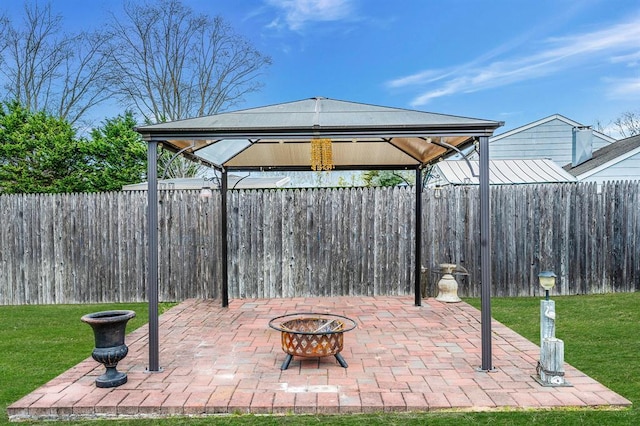view of patio / terrace featuring a gazebo and an outdoor fire pit