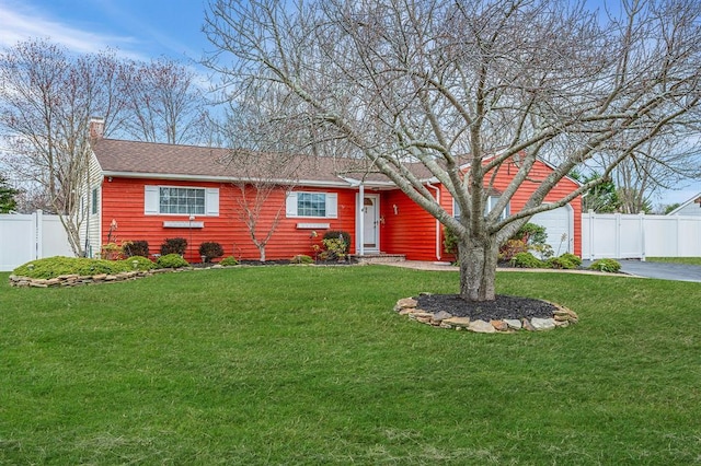 24 Thomas St, Coram, NY 11727 - view of front of property featuring a chimney and driveway