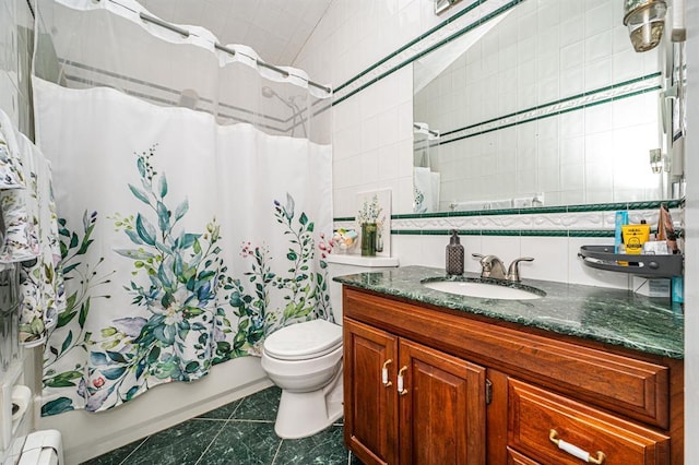 24 Thomas St, Coram, NY 11727 - full bath with tile walls, shower / bath combo, toilet, backsplash, and vanity