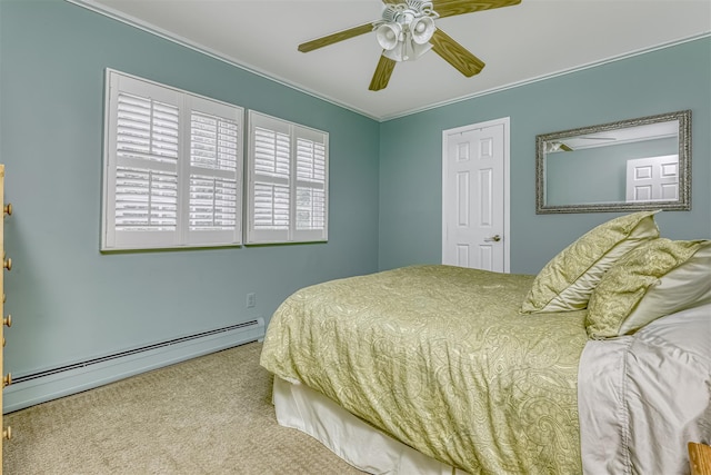 bedroom featuring baseboard heating, carpet flooring, crown molding, and a ceiling fan