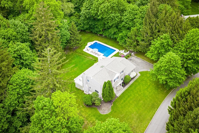 view from above of property with a pool area