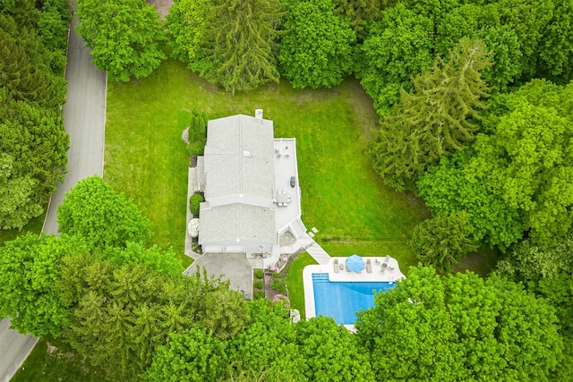 view of subject property featuring a pool