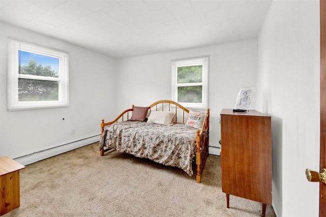 680 Corbalis Pl, Yonkers, NY 10703 - carpeted bedroom featuring baseboard heating and a baseboard radiator
