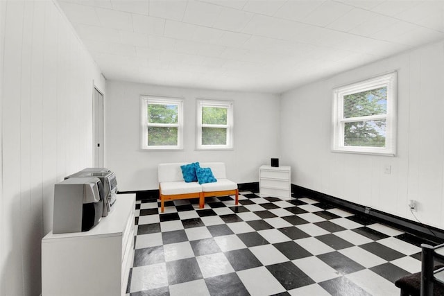 680 Corbalis Pl, Yonkers, NY 10703 - living area featuring dark flooring and wooden walls